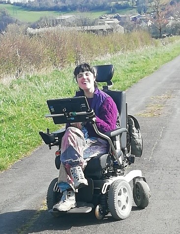 Sam in her wheelchair